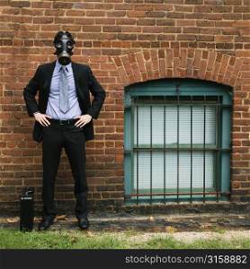 Business man with a gas mask