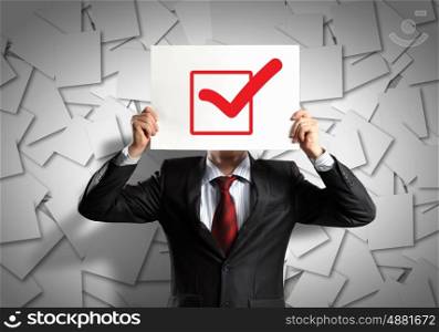 Business man with board. Image of businessman holding message board. Conceptual photo