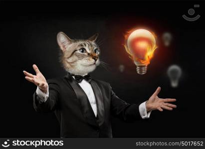 Business man with cat head looking at burning bulb having a great idea