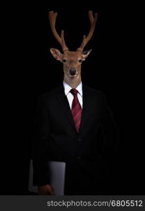 business man with deer head in the dark