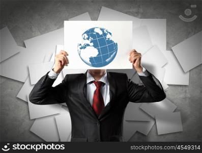 Business man with drawing. Image of businessman holding drawing against face. Conceptual photo