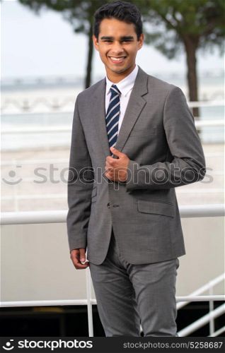 Business man with suit in outdoor ambient