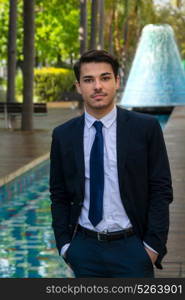 Business man with suit in outdoor ambient