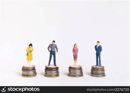 business man woman sitting equal piles coins