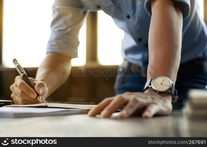 Business man working at office with laptop and documents on his desk freelancer concept