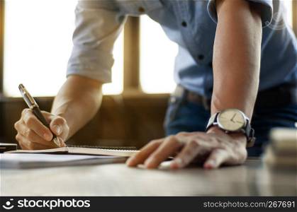 Business man working at office with laptop and documents on his desk freelancer concept