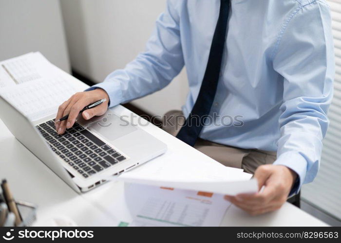 Business man working by using laptop computer Hands typing on a keyboard. Professional investor working new start up project. business planning in office. Technology business Concept. 