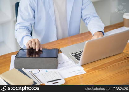 Business man working by using laptop computer Hands typing on a keyboard. Professional investor working new start up project. business planning in office. Technology business Concept