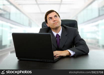business man working with is laptop, at the office