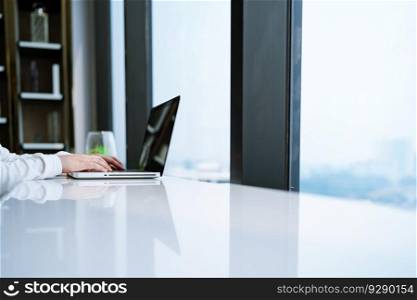 Business man working with laptop. Young business man thinking Concentrated at work