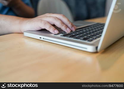 Business man working with laptop. Young business man thinking Concentrated at work