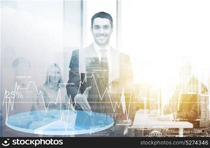 business, marketing and people concept - handsome businessman with open hand ready for handshake with charts over city background and double exposure effect. businessman with open hand ready for handshake