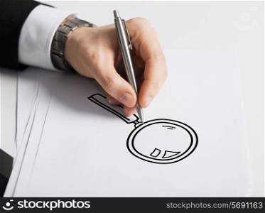 business, marketing, planning and people concept - close up of male hand with pen drawing lens on white paper