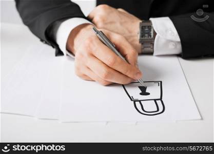 business, marketing, planning and people concept - close up of male hands with pen drawing lock on white paper