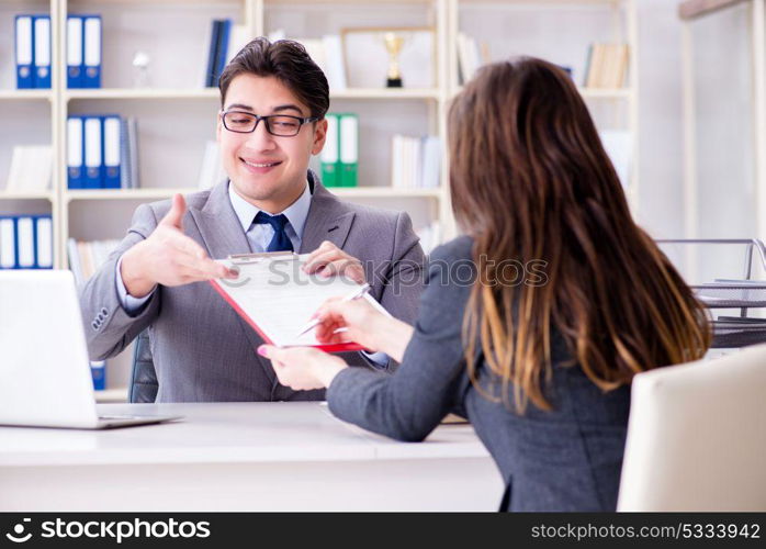 Business meeting between businessman and businesswoman