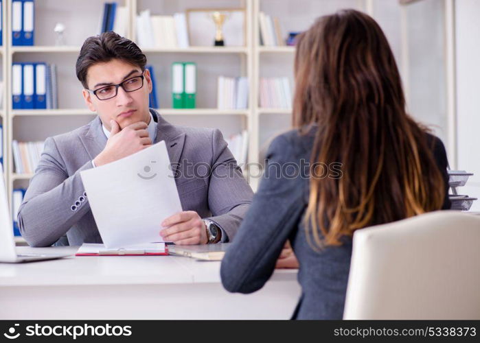 Business meeting between businessman and businesswoman