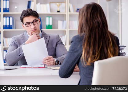 Business meeting between businessman and businesswoman