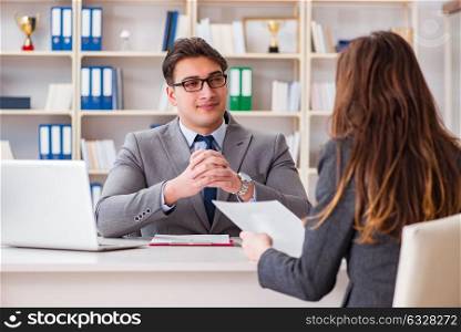 Business meeting between businessman and businesswoman