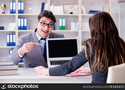 Business meeting between businessman and businesswoman