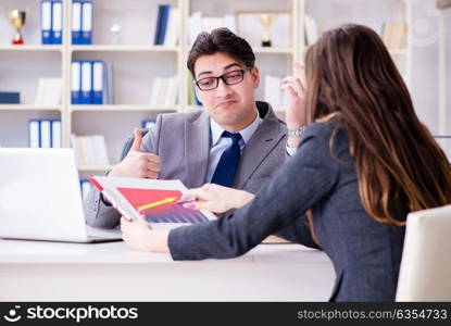 Business meeting between businessman and businesswoman