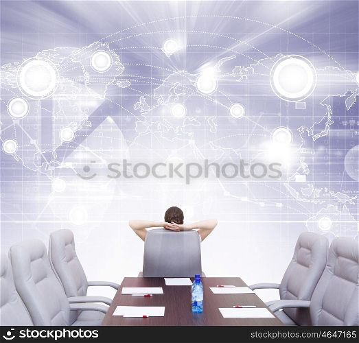 Business meeting. Businesswoman boss in conference room sitting with back in chair