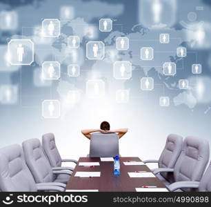 Business meeting. Businesswoman boss in conference room sitting with back in chair