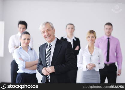 Business meeting - Handsome young Arabic man presenting his ideas to colleagues and listening for ideas for success investments at bright modern office room