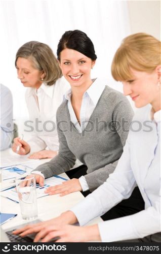 Business meeting teamwork in the office young woman smiling
