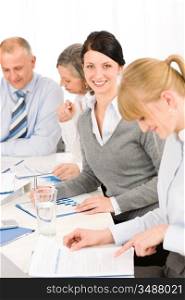 Business meeting teamwork in the office young woman smiling