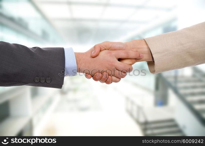 Business men hand shake at the office