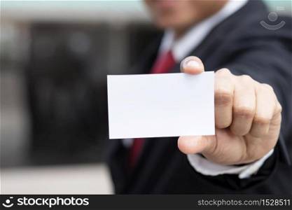 Business men holding business cards for customers