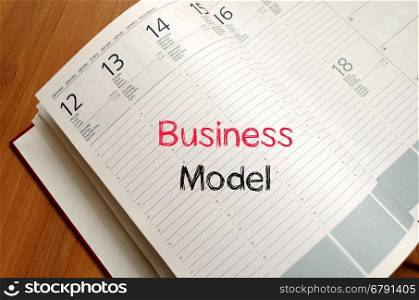Business model text concept write on notebook
