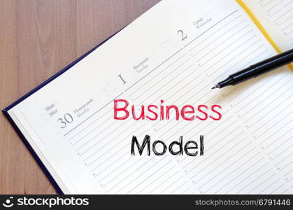 Business model text concept write on notebook