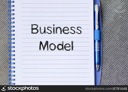 Business model text concept write on notebook