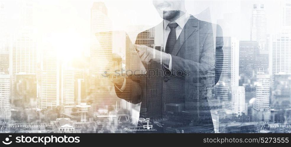 business, modern technology and communication concept - close up of businessman with tablet pc computer over city background and double exposure effect. smiling businessman with tablet pc computer