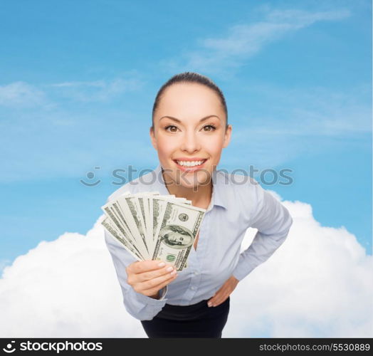 business, money and banking concept - smiling businesswoman with dollar cash money