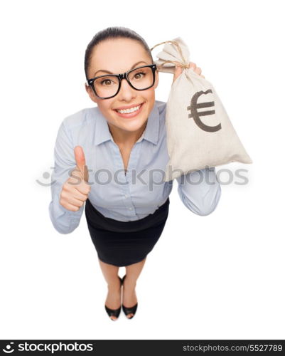 business, money and office concept - smiling businesswoman in eyeglasses holding money bag with euro and showing thumbs up