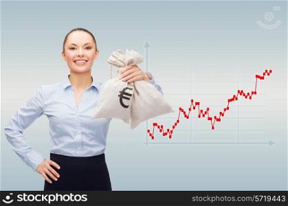 business, money and people concept - smiling businesswoman in eyeglasses holding money bags with dollar over gray background and forex graph