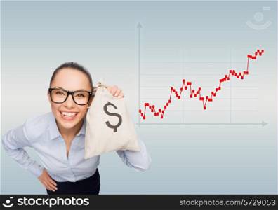 business, money and people concept - smiling businesswoman in eyeglasses holding money bag with dollar over gray background and forex graph
