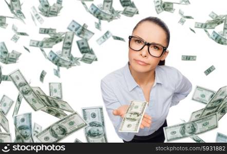 business, money, financial crisis and banking concept - displeased businesswoman in eyeglasses with dollar cash money over blue background