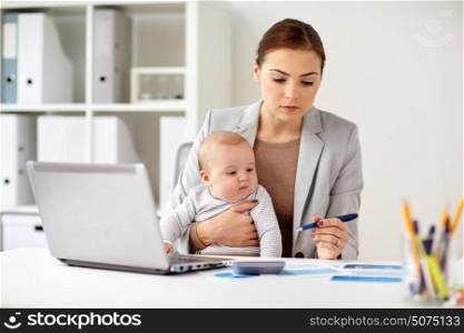 business, motherhood, multi-tasking, family and people concept - happy businesswoman with baby and laptop computer working at office. happy businesswoman with baby and laptop at office