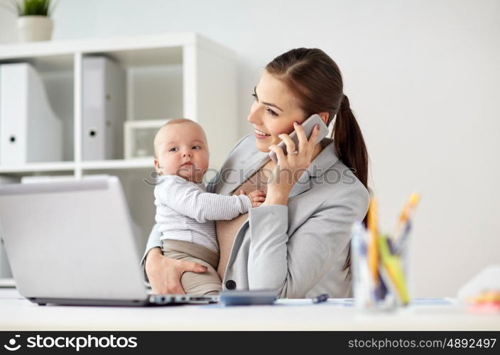 business, motherhood, multi-tasking, family and people concept - happy smiling businesswoman with baby calling on smartphone at office