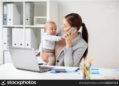 business, motherhood, multi-tasking, family and people concept - smiling businesswoman with baby calling on smartphone at office