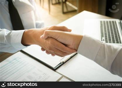 business negotiation in meeting hands shaking successful agreement