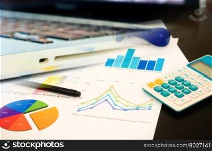 Business of financial analytics desktop with accounting charts and diagrams.Business Concept