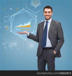business, office, advertising and people concept - businessman showing virtual screen with graphs