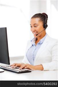 business, office and communication concept - african female helpline operator with headphones