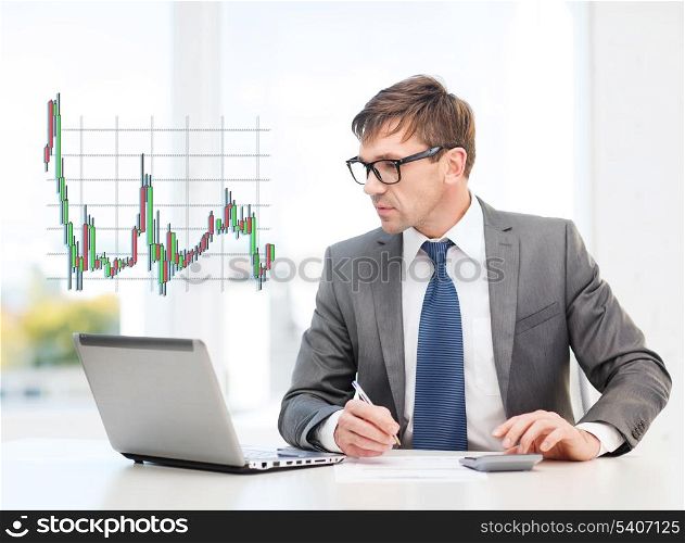 business, office and money concept - businessman in suit and black eyeglasses with laptop computer, papers, calculator and forex chart