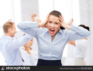 business, office and stress concept - angry screaming businesswoman