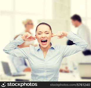 business, office and stress concept - angry screaming businesswoman